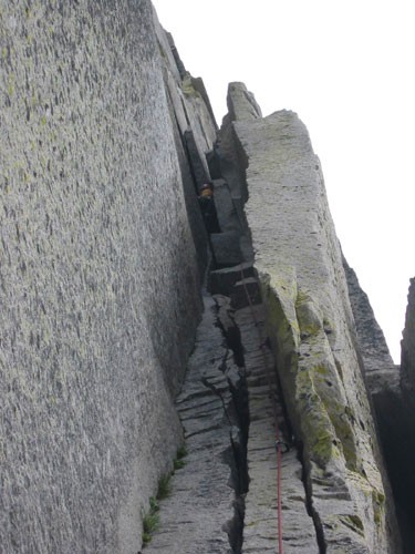 Matt Owen getting ready for the crux of the chimney section of the rou...