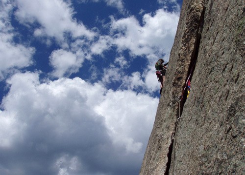 Errett Allen on the classic "J Crack" 5.9. Lumpy Ridge, Colorado. 2005...