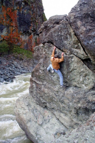 Marcos Nunez high over the Russian River on Cracker &#40;V0R/X&#41;.