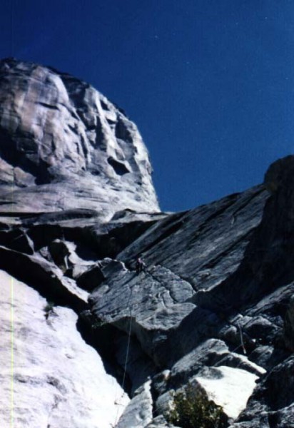 Climber on the spectacular 5.10c fingers on Pitch 1.