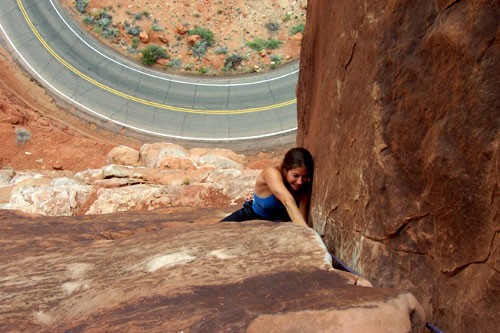 Sarah Felchlin enjoying a 5.9 fist section at the top of pitch 1.