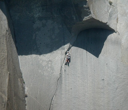 A climber on the Great Roof nearing the C2 &#40;or 5.13&#41; crux on T...