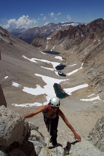 Sarah Felchlin low on the route of Fishhook Arête, Mt Russell with Arc...