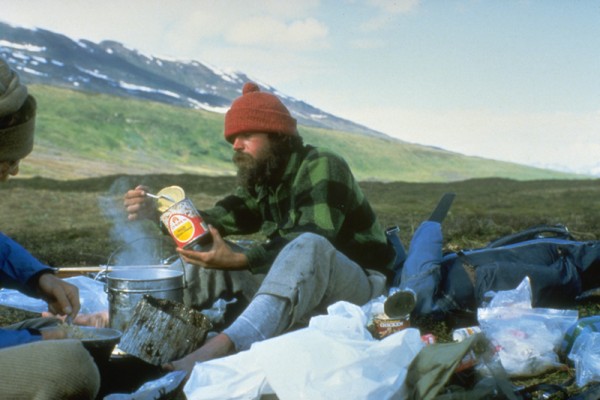 Chowing down on canned goods salvaged from a bear-destroyed miners sha...