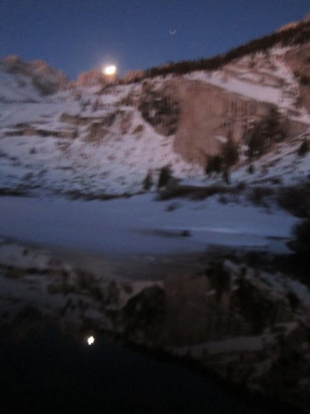 February almost-full Moon sets over the Sierra on my predawn approach ...