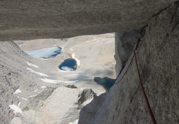 Looking back at the traverse under the huge block with Royce lakes bel...