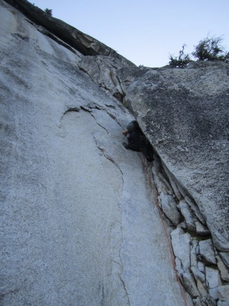 Nate in the little chimney just before the 10b traverse &#40;swing&#41;