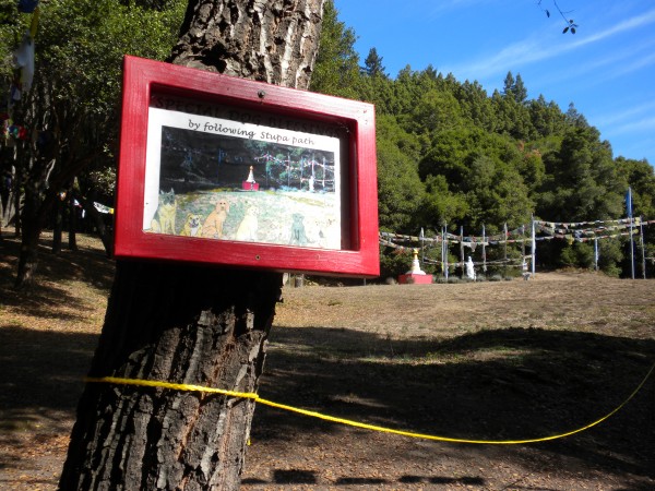 "Special Blessing for Dogs  by following the Stupa Path"  The signage ...