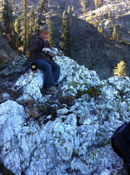 Large pile of quartz about half way up.