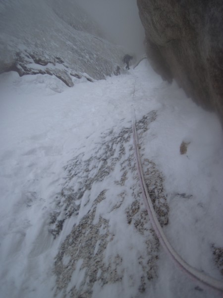 A couple of rappels to go. Steve rappelling between spindrift avalanch...