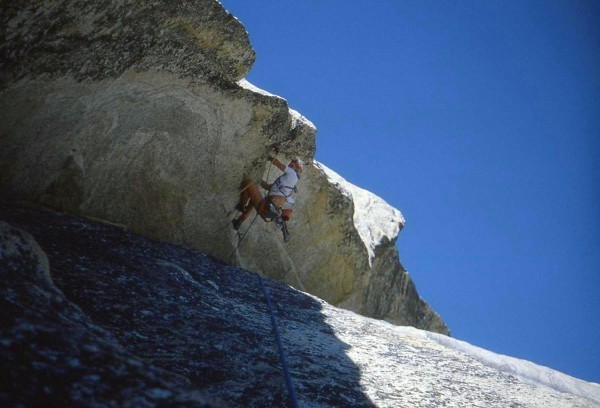 Pulling through the holds below the roof.