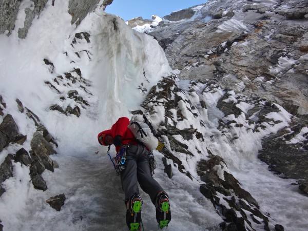 An overhanging wave of snice in the north couloir, still 3400 feet bel...