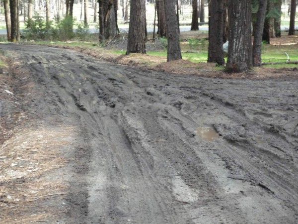 The first crux: getting through the mud on the logging road. Subaru Ou...