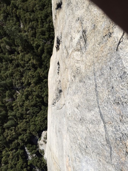 The long 5th pitch climbs the slab in the foreground, the seam in the ...