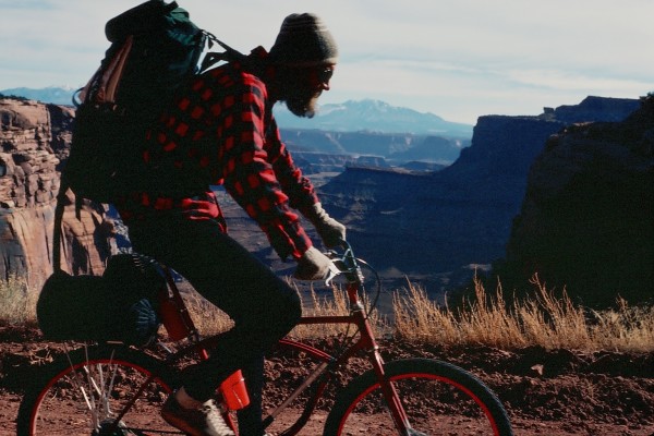 Steve tooling along the White Rim Trail about a mile from where it int...