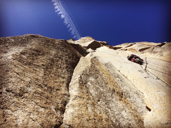 Todd leading the 2nd pitch, which ends at the roof up to his left.