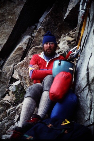 John seeking shelter from the storm at the top of the first pitch.