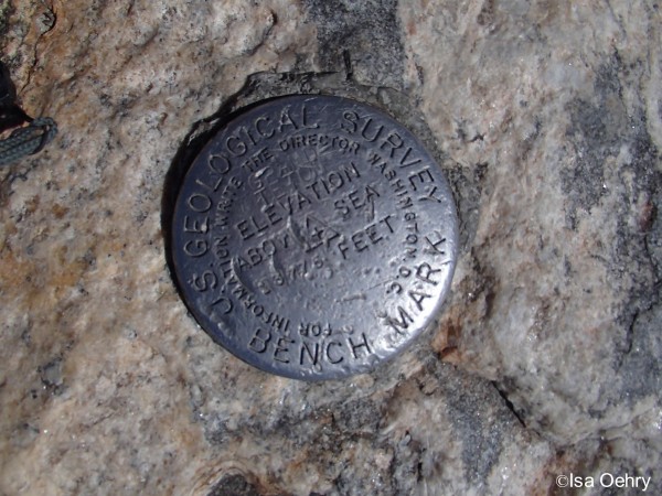 The Benchmark on the summit of the Grand