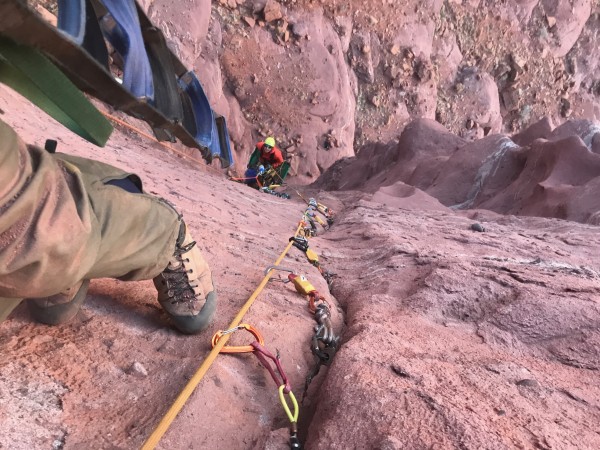 Excavating pitch three while Keiko is at the belay on John Middendorf'...