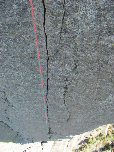 Looking down on the crux of the first pitch of One Way Sunset one swee...