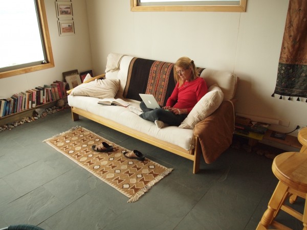 Angela relaxing in our living room in Patagonia