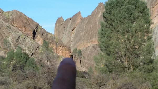 Finger pointing at the line. Only upper third of climb visible. Final ...