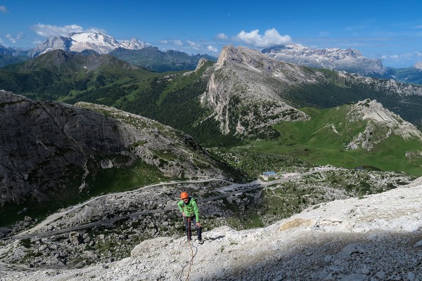 View from the large choss ledge system part way up, the Marmolada in t...