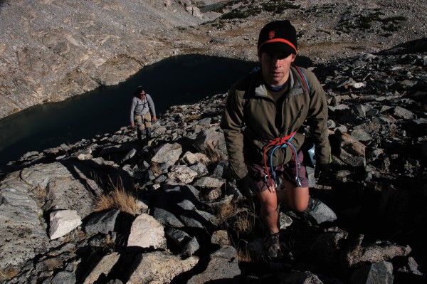 Jeremy and Ryan ascend the talus to the base of the route.