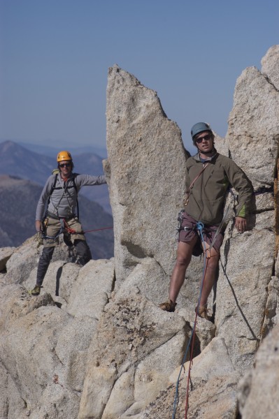 Jeremy and Ryan on the final traversing pitch on the W. side of the ri...