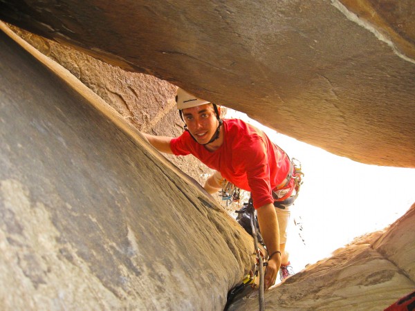 Jason about to squeeze under the chockstone on Frogland