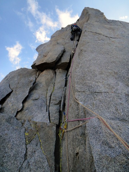 Chris leading the final 5.7 pitch. Watch for loose blocks that are tem...