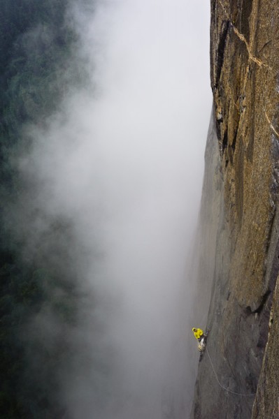 Andrew looks up from the belay before Dolt Hole as the weather worsens...